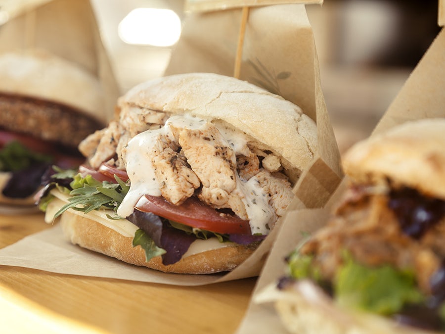 Food truck sandwiches ready for pickup at a community event