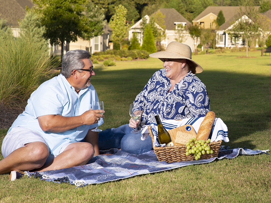 Homeowners enjoying a picnic.